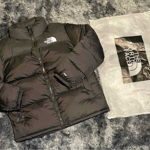 The North Face Black Puffy Winter Jacket with White Logo